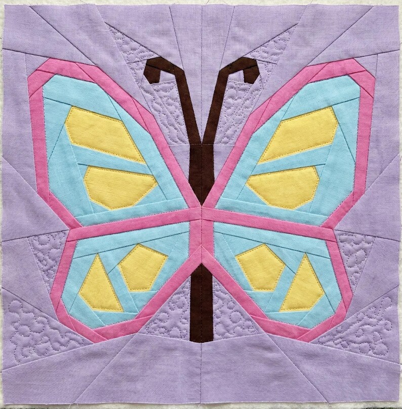 Butterfly quilt block pattern in 4 different sizes, perfect scrap buster, shown with sewing utensils