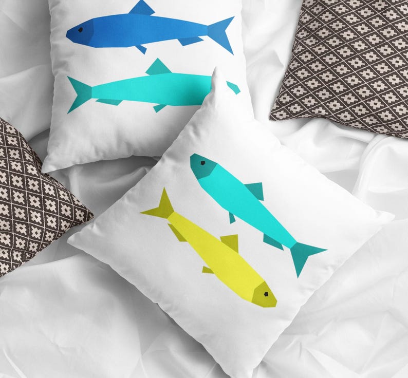 Sardines Quilt block pattern, used to make two super sunny summer pillows with two sardines each. The colors are blue and turquoise with bright yellow.