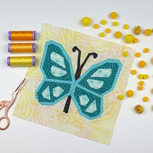 Butterfly Quilt Block Pattern, blue butterfly on yellow background