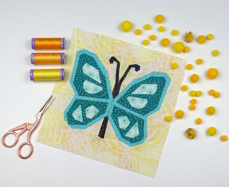 Butterfly Quilt Block Pattern, blue butterfly on yellow background