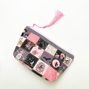 Patchwork zipper pouch sewing pattern in three sizes, the pouches are patchwork pouches, sewn with small fabric squares and contrast binding along the zipper with matching zippers. Zipper pouch sewing pattern
