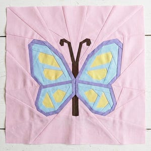Butterfly quilt block pattern in 4 different sizes, perfect scrap buster, shown with sewing utensils