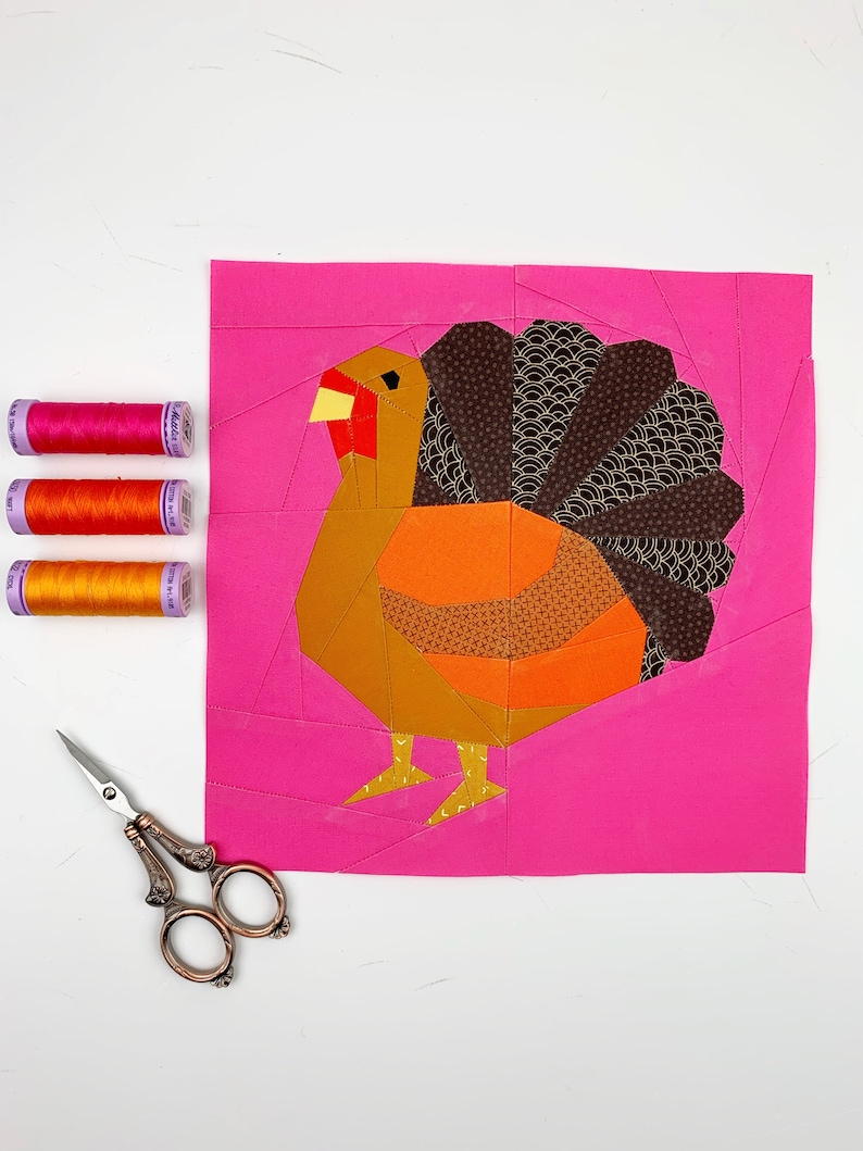 turkey quilt block pattern brown colored turkey on pink background