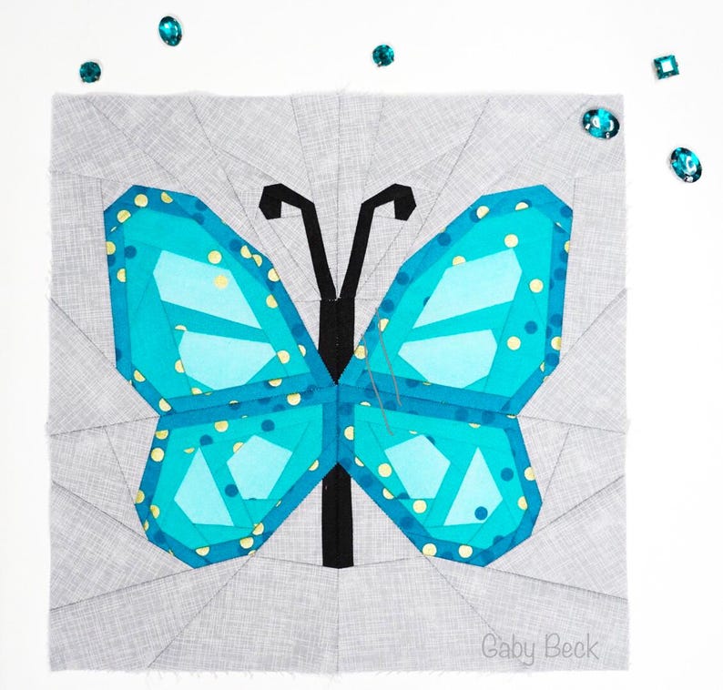 Butterfly quilt block pattern in 4 different sizes, perfect scrap buster, shown with sewing utensils