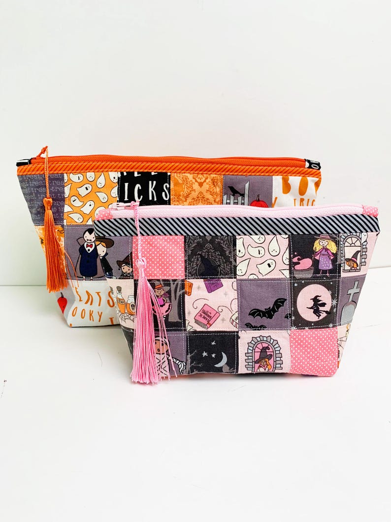 Patchwork zipper pouch sewing pattern in three sizes, the pouches are patchwork pouches, sewn with small fabric squares and contrast binding along the zipper with matching zippers. Zipper pouch sewing pattern