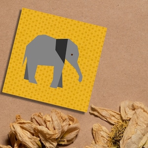 elephant quilt block pattern , baby elephant in gray on yellow background