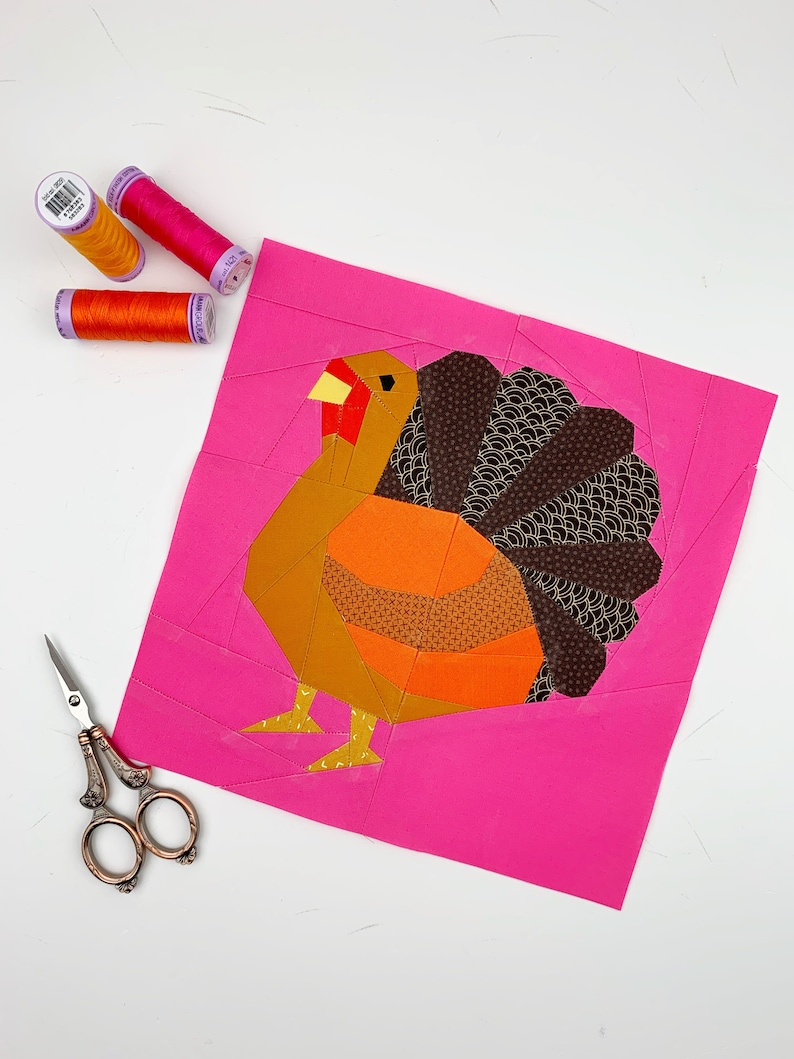 turkey quilt block pattern brown colored turkey on pink background