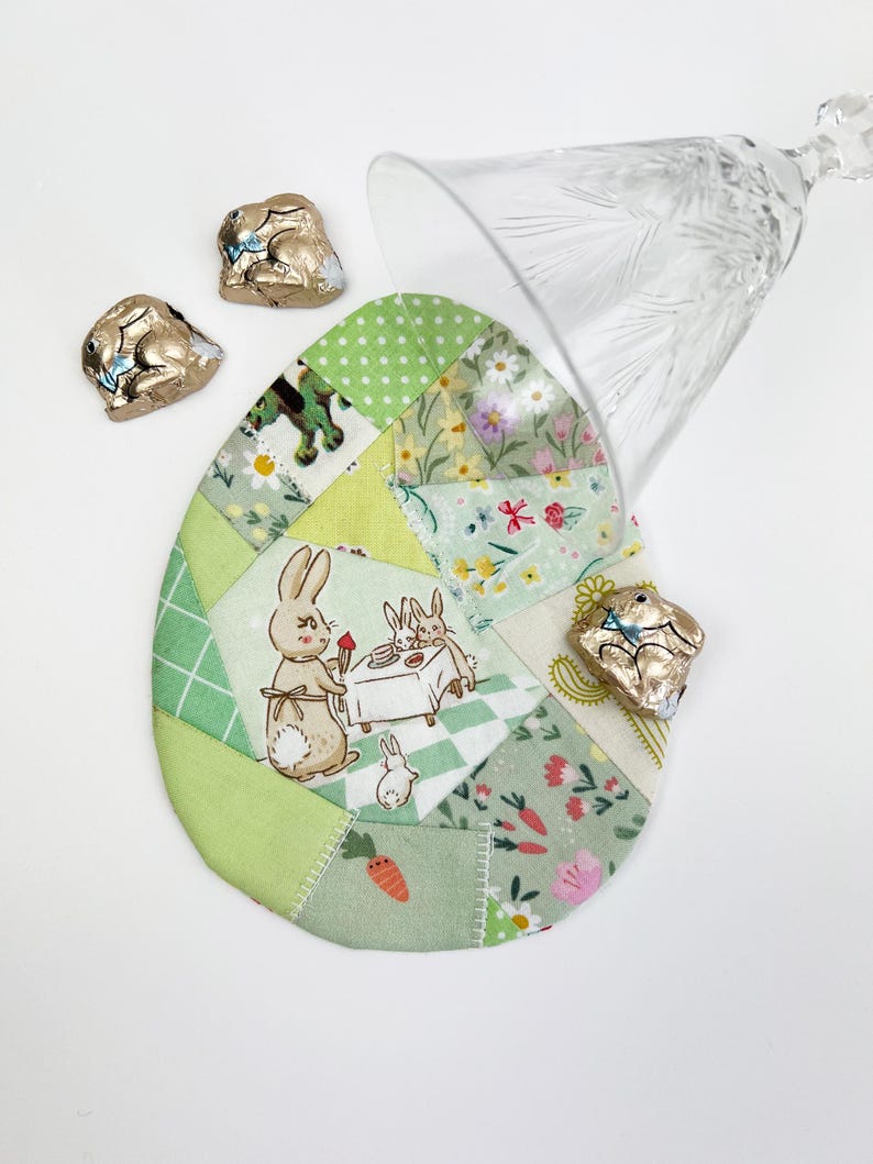 Patched Easter Egg placemat and Coaster/ Mug rug pattern. These are made out of random fabric scraps, they're the perfect scrap busters.