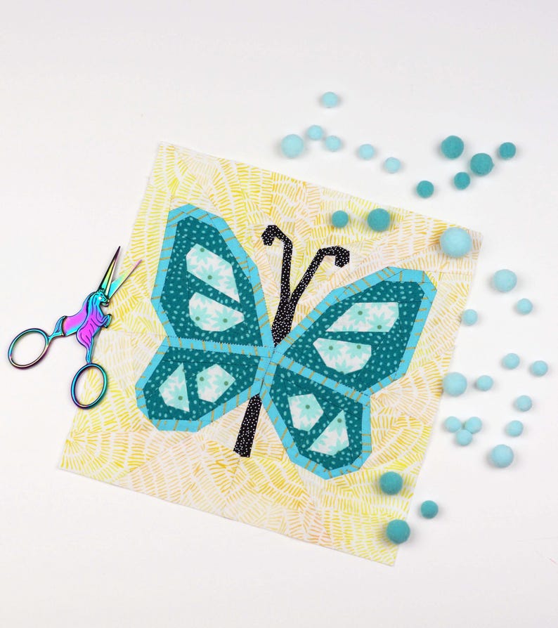 Butterfly quilt block pattern in 4 different sizes, perfect scrap buster, shown with sewing utensils