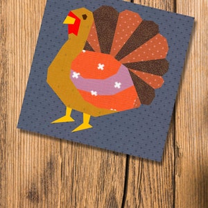 turkey quilt block pattern brown colored turkey on blue background