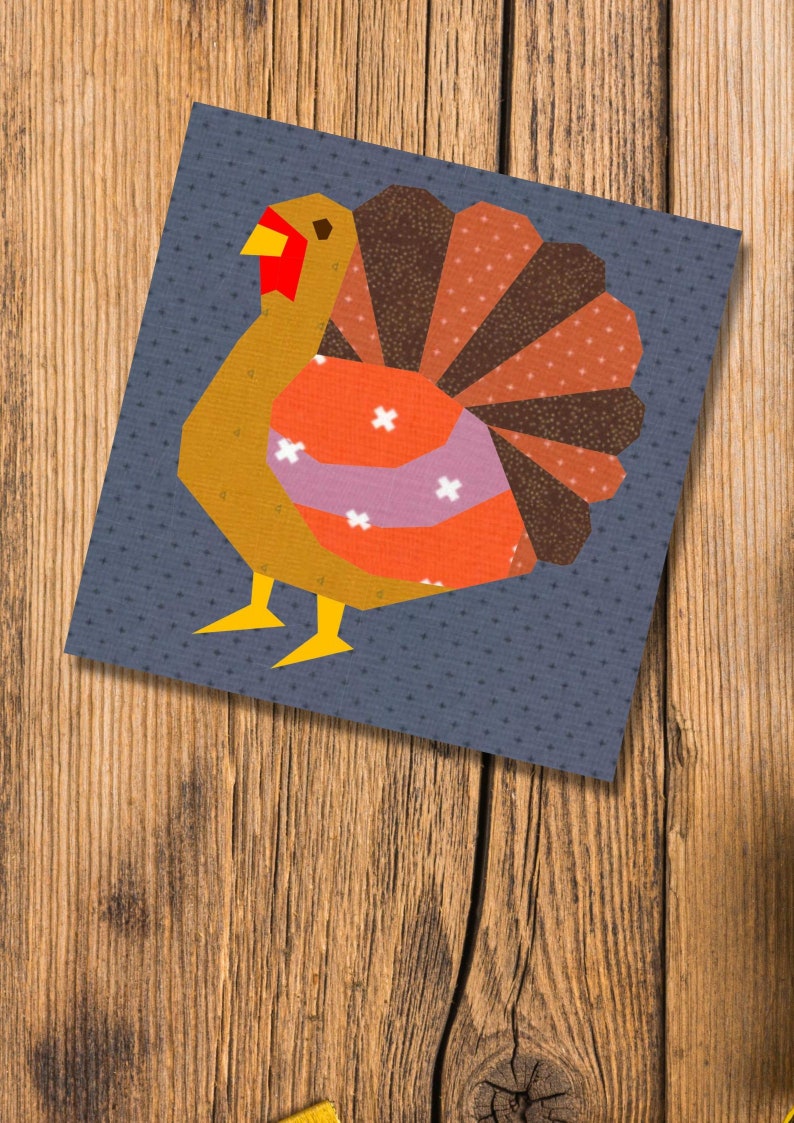 turkey quilt block pattern brown colored turkey on blue background