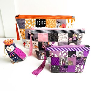 Patchwork zipper pouch sewing pattern in three sizes, the pouches are patchwork pouches, sewn with small fabric squares and contrast binding along the zipper with matching zippers. Zipper pouch sewing pattern