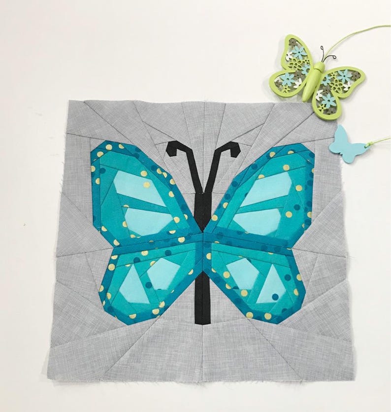 Butterfly quilt block pattern in 4 different sizes, perfect scrap buster, shown with sewing utensils