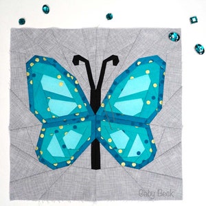 Butterfly Quilt Block Pattern, blue butterfly on grey background