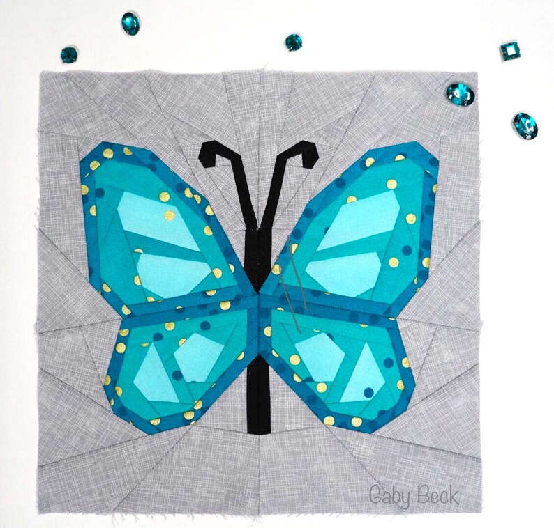 Butterfly Quilt Block Pattern, blue butterfly on grey background