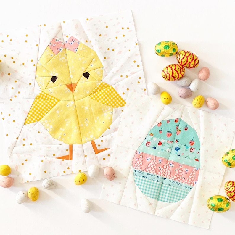 May include: Two fabric patchwork squares, one with a yellow chick and the other with a pastel blue and pink egg. Both squares have a white background with gold polka dots. The egg square has the text "peha dots x a little sweet" in pink.