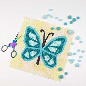 Butterfly Quilt Block Pattern, blue butterfly on yellow background