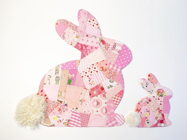 bunny shaped placemat and coaster sewing pattern, sewn with fabric scraps in pink with a fake fur little tail.
