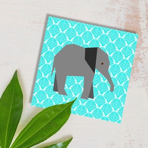 elephant quilt block pattern , baby elephant in gray on blue background