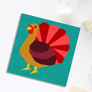 turkey quilt block pattern brown colored turkey on teal background