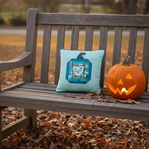 log cabin pumpkin quilt block pattern in 5 different sizes, from 4x4 inch for ornaments to 6x6, 8x8, 10x10 and 12x12 inches for all sorts of amazing Halloween sewing projects. Use your favorite fabrics to fussy cut the center and turn these amazing beauties into your own pumpkin patch.