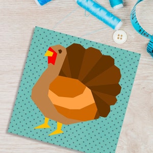 turkey quilt block pattern brown colored turkey on teal background