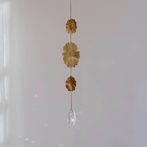 Kinetic brass suncatcher, gold metal sun catcher and crystal ball