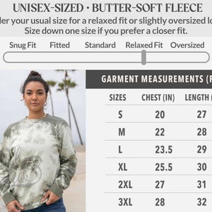May include: A woman models a unisex tie-dye fleece sweatshirt in olive green and white. The image includes a size chart with chest and length measurements in inches. The text reads: Unisex-Sized Butter-Soft Fleece. Measurements are provided in inches.