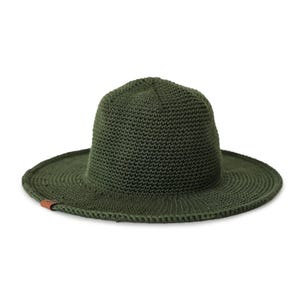 May include: A dark green, crocheted hat with a wide brim. The hat has a rounded crown and a small, brown leather tag attached to the brim. The hat is made of a textured, knitted material and is set against a white background.