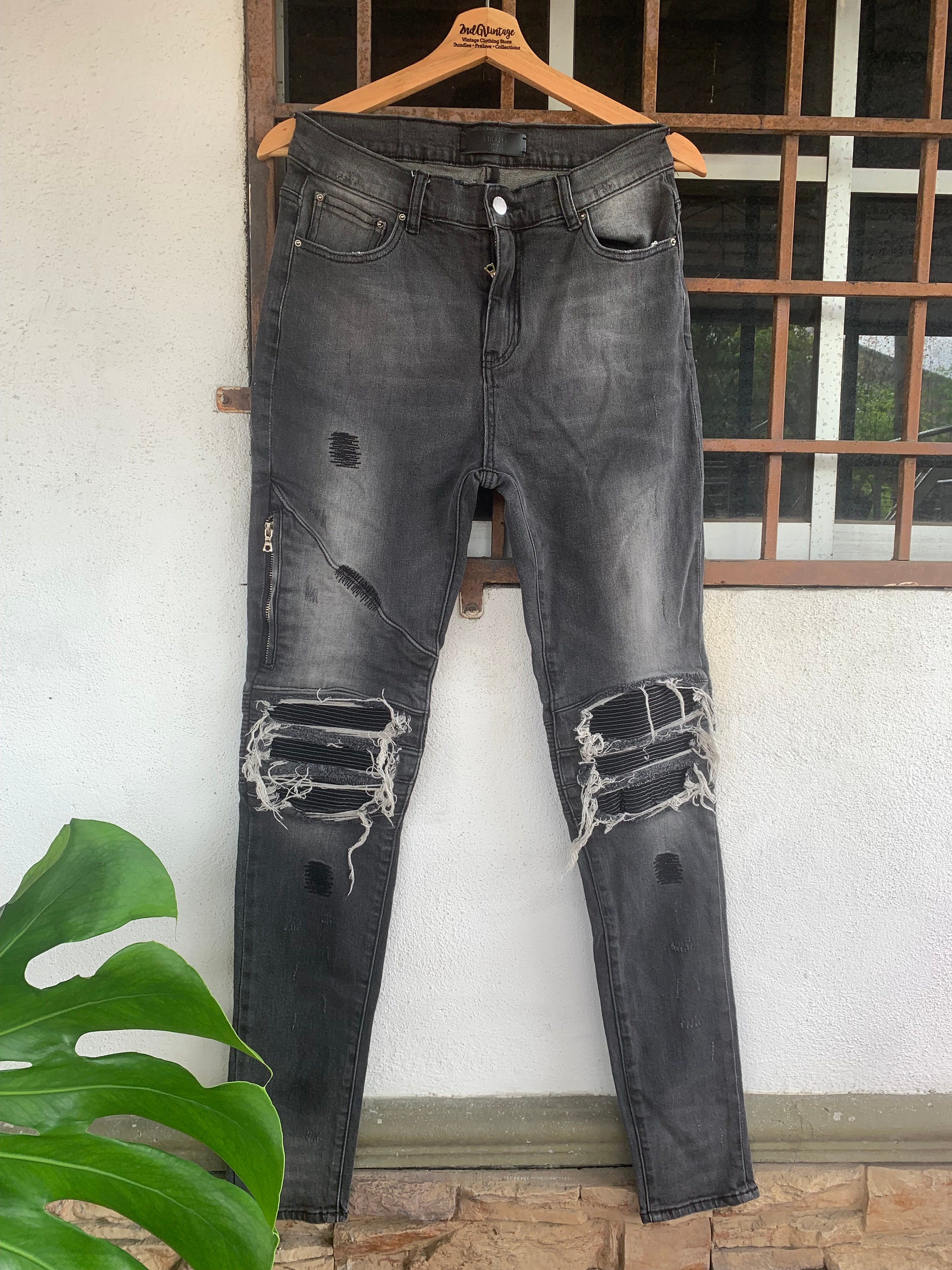 Amiri jeans with stripe sales