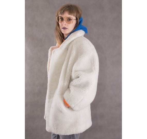 white shaggy jacket
