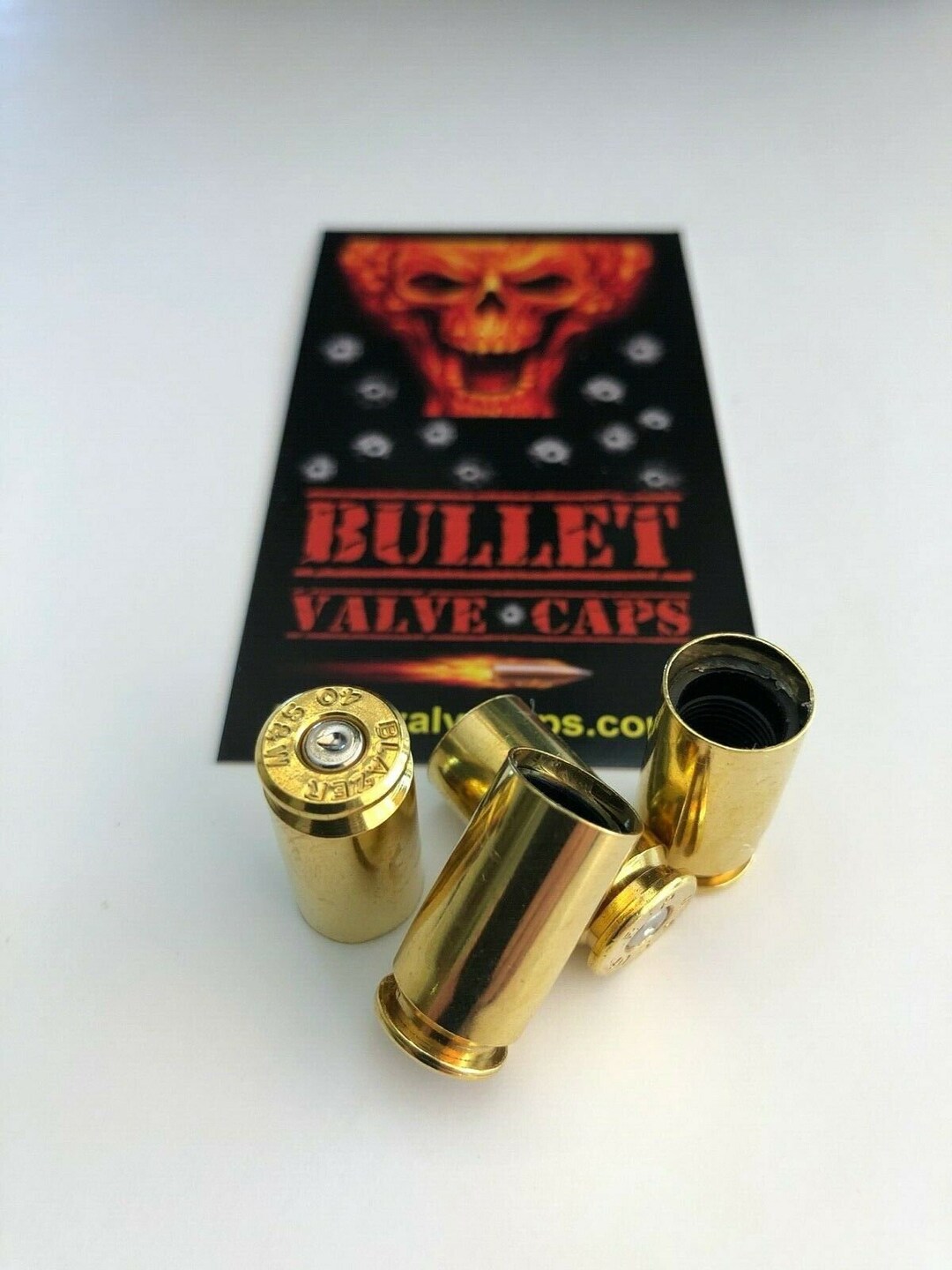 4 Bullet Valve Caps Brass Finish With Silver Primer40 Cal....tpms