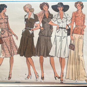 May include: A vintage sewing pattern for four different skirt and top combinations. The pattern features a brown, white, and beige color scheme. The pattern is titled "Vogue's Basic Design" and has the number 1207.