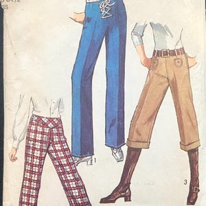 May include: Vintage Simplicity sewing pattern 3926 featuring illustrations of flared pants in various styles. The pattern includes options for different fabrics and designs, with a focus on proportioning for height. The pattern is size 10, waist 24, hip 34 1/2.