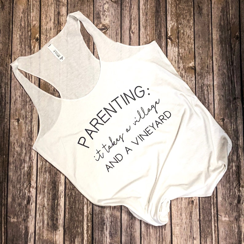 PARENTING TANKWINEit takes a villageand a vineyardmom shirttank topbella canvascomfy tank topsoftsparklefunny mom quote
