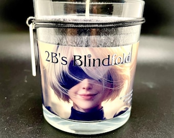 La vela con los ojos vendados de 2B está inspirada en NieR: Automata.