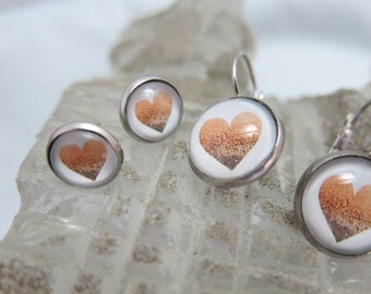 Stainless steel earrings 16 mm hanging or 12mm buttons.  Hypoallergenic.