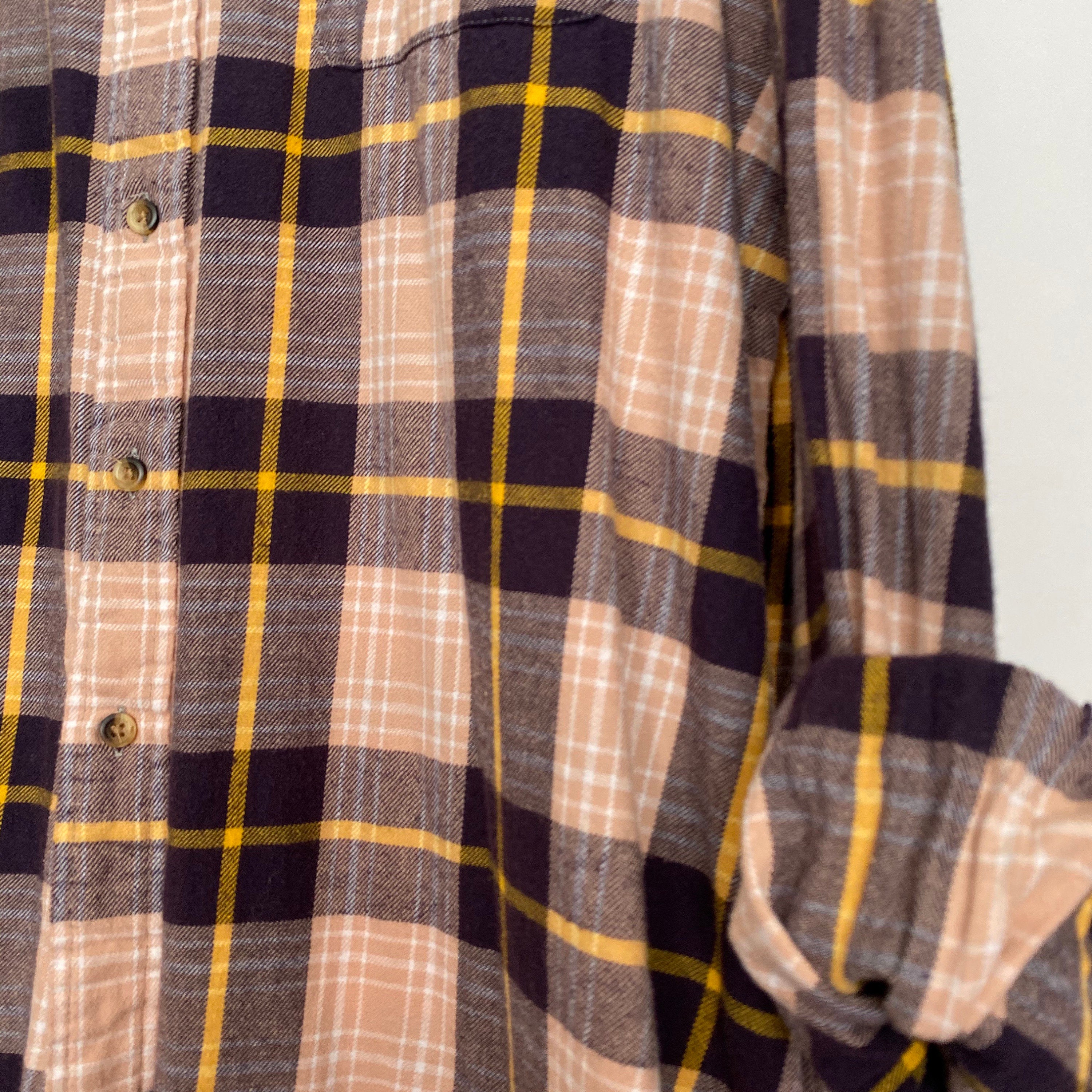 purple and yellow plaid shirt
