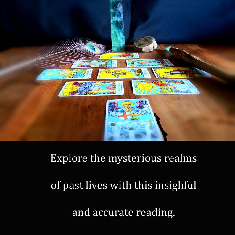 May include: A tarot card spread on a wooden table with a peacock feather, a crystal, and a wand. The cards are arranged in a cross pattern. The spread is used to explore past lives.