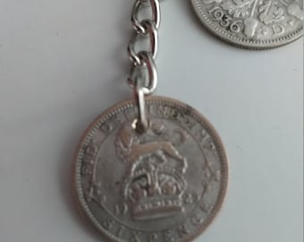 Nyckelring i silver med sex pence