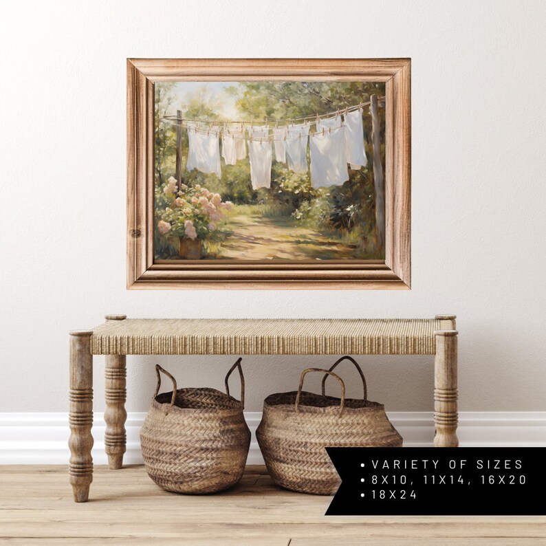 Charming laundry room art: Sheets on clothesline amid floral landscape, a modern print capturing serene spring scenery.