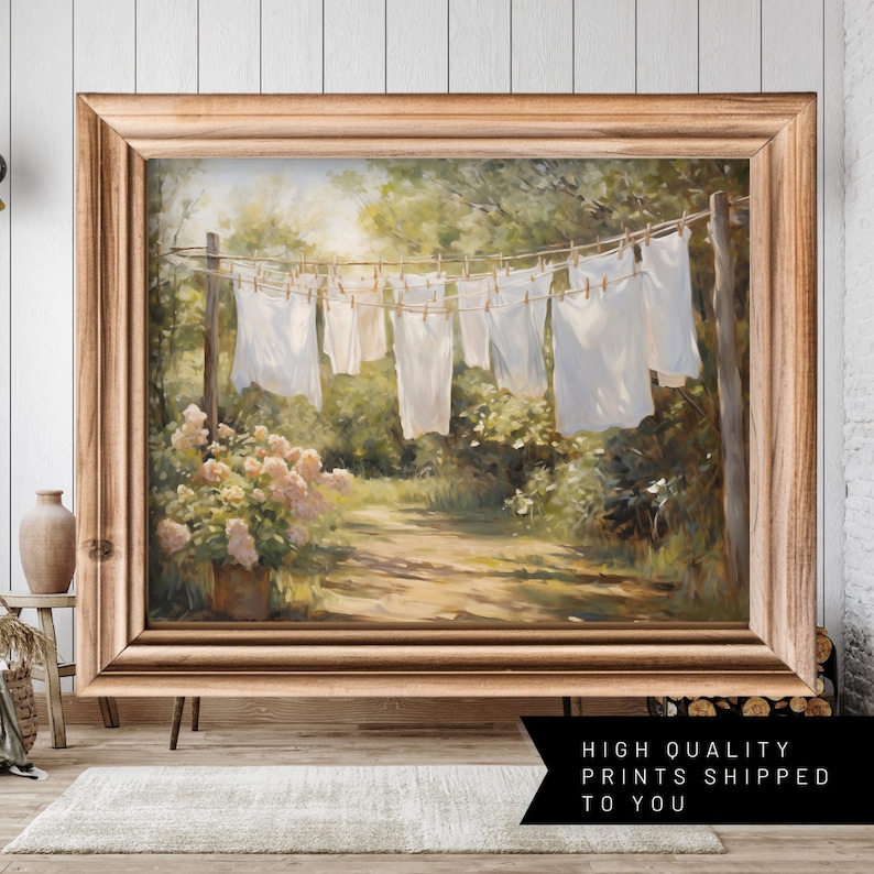 Charming laundry room art: Sheets on clothesline amid floral landscape, a modern print capturing serene spring scenery.