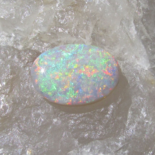 Pinpoint Rainbow Flash Solid Coober Pedy Opal Cabochon: 4.5 Cts. (16.5mm L X 12mm W)