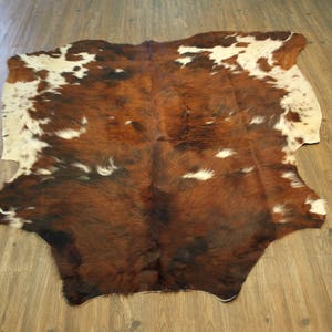 100% Premium Hair-On Cowhide Area Rug In Solid Brown/Ivory (74&quot;x 79&quot;)