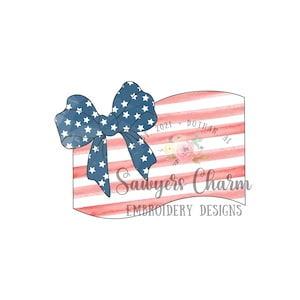 May include: A red, white, and blue American flag with a blue bow on top. The flag is watercolor painted and has a white border. The text "Sawyers Charm Embroidery Designs" is below the flag.