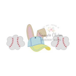 May include: Embroidered design of a baseball cap with bunny ears and two baseballs. The text "Sawyers Charm Embroidery Designs" is included in the design.