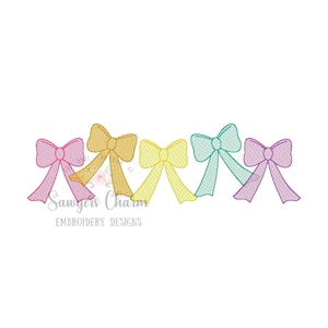 May include: Five embroidered bows in a rainbow color scheme. The bows are pink, yellow, light green, teal, and purple.