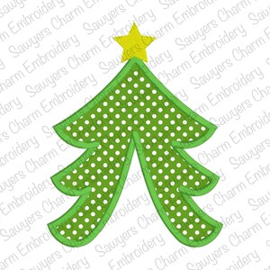 May include: A green Christmas tree with white polka dots and a yellow star on top. The tree is outlined in green.