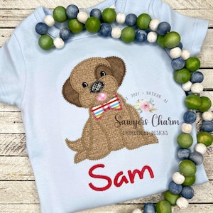 Diseño de bordado a máquina con aplique de cachorro con pajarita, puntada en zigzag