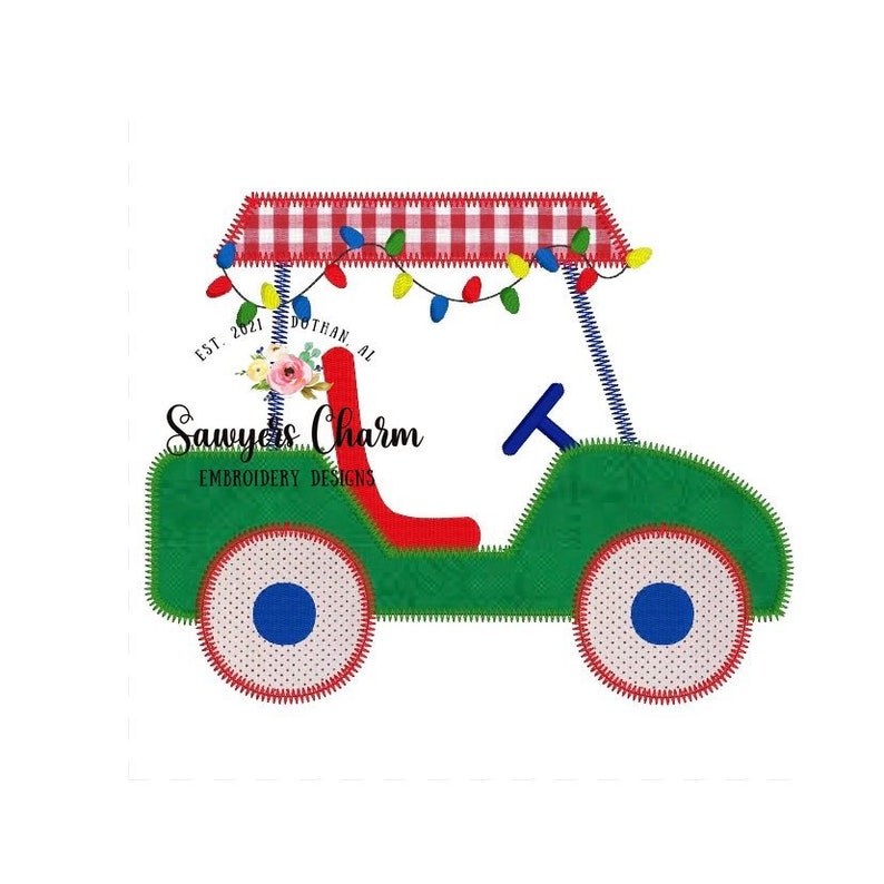 May include: A green and red golf cart with a red and white checkered canopy and string lights. The cart has a blue steering wheel and blue and white wheels. The text "Sawyers Charm Embroidery Designs" is on the side of the cart.